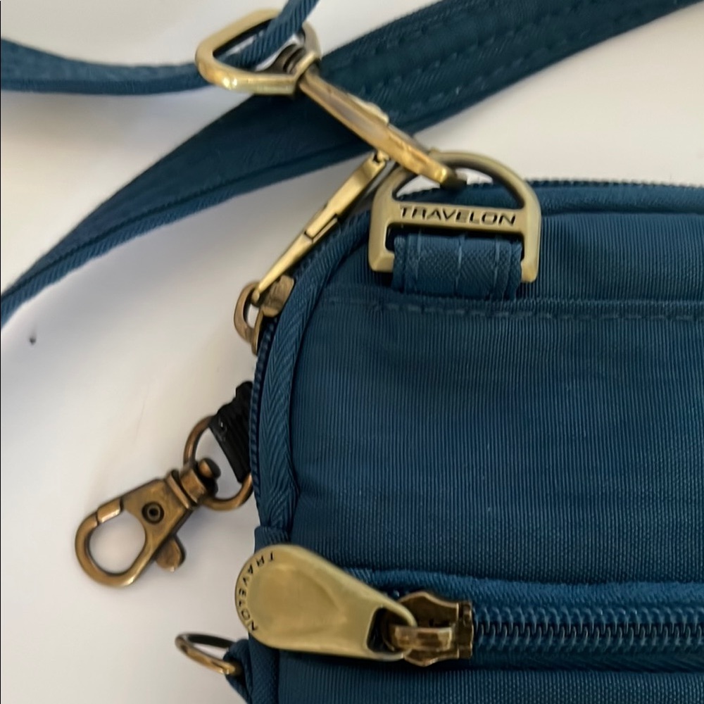 Travelon AntiTheft Signature Slim Pouch Quilted Blue Crossbody Bag - Picture 3 of 9